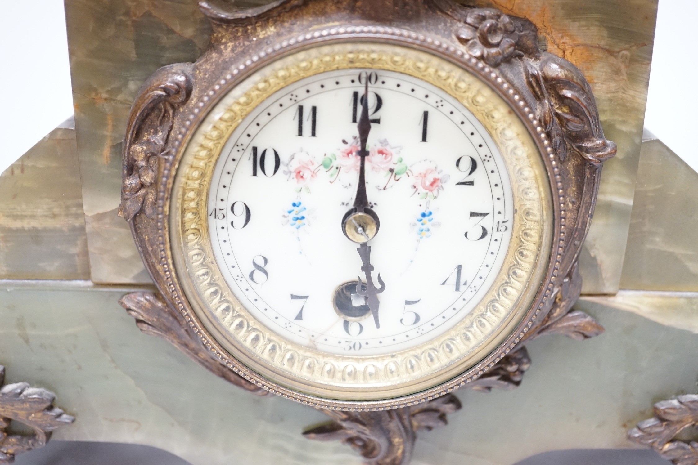 A French figural bronze mounted green onyx clock, 30cm